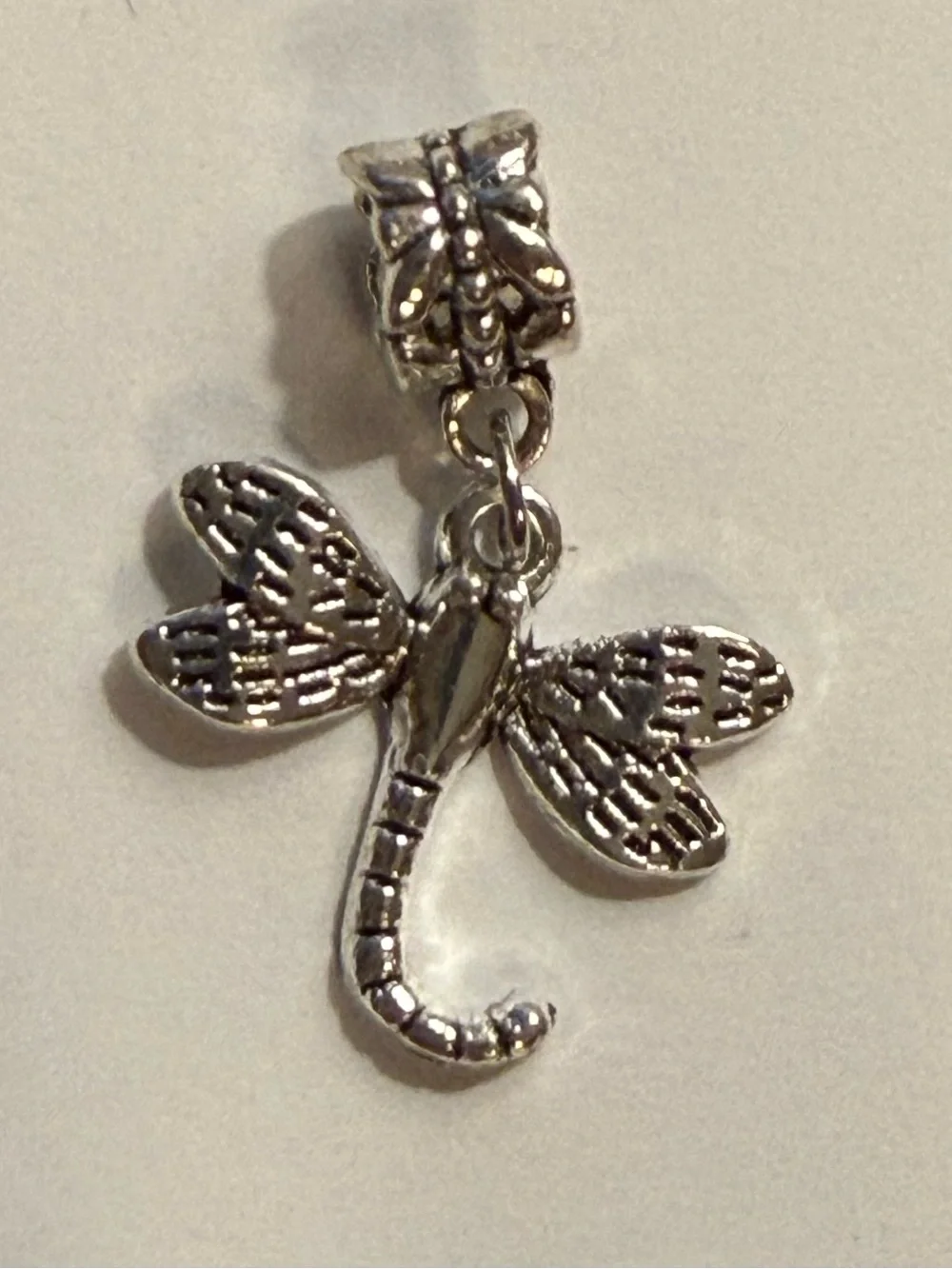 Charm / pendant - dragonfly charm w/butterfly on bail - silver tone. New!